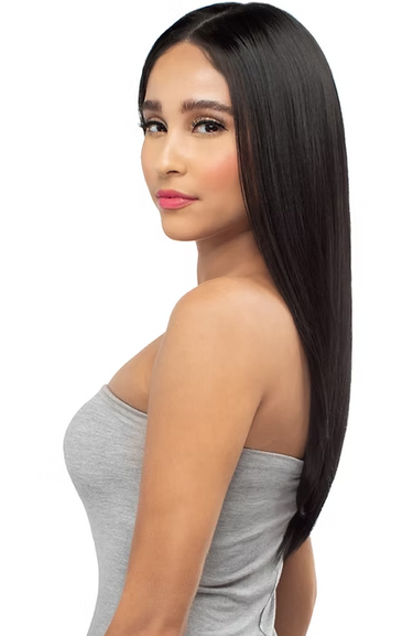 Woman with long black hair wearing a gray strapless top on a white background
